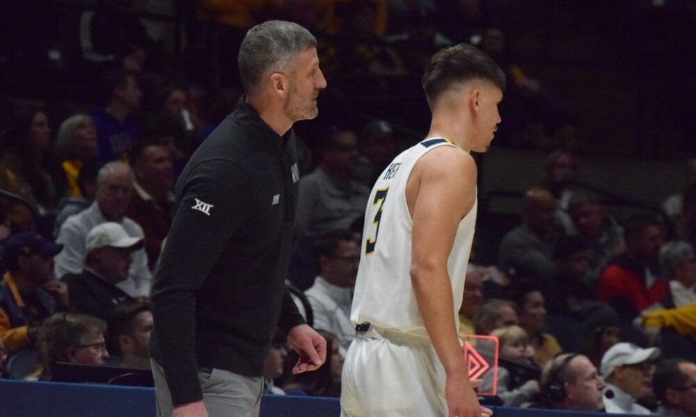 WVU Interim HC Josh Eilert and Kerr Kriisa