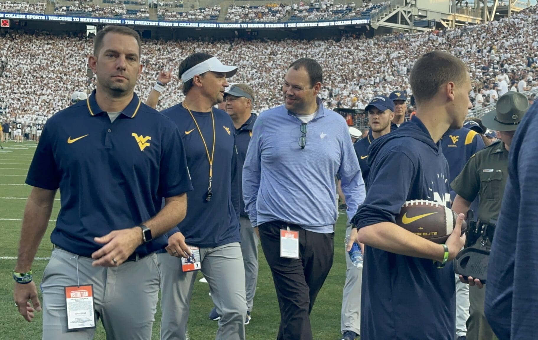 WVU Football HC Neal Brown and WVU AD Wren Baker