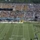 WVU flag on field at UCF