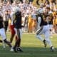 WVU Defense Celebration Josiah Trotter, Anthony Wilson, and Tyrin Bradley