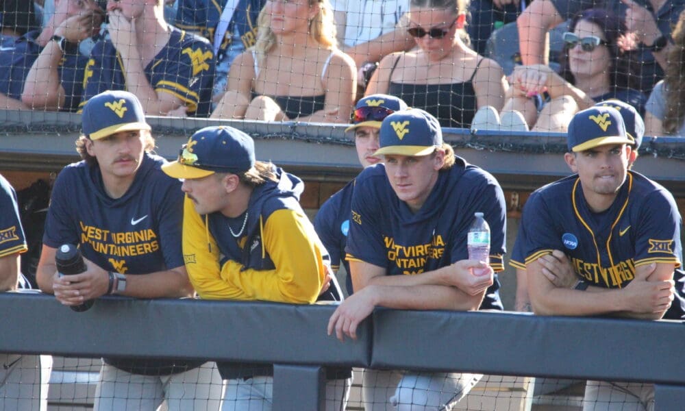 WVU Baseball players in dugout