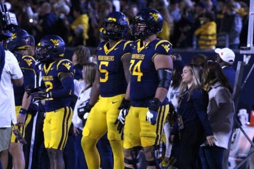 WVU Football Coin Toss Wyatt Milum and Jaden Bary