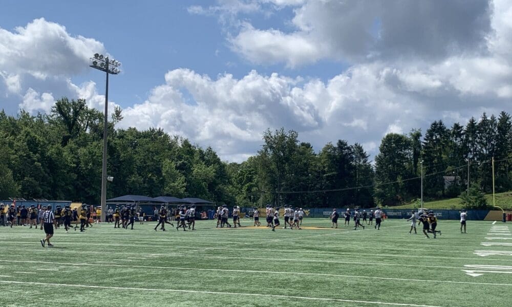 WVU Football at practice field stock