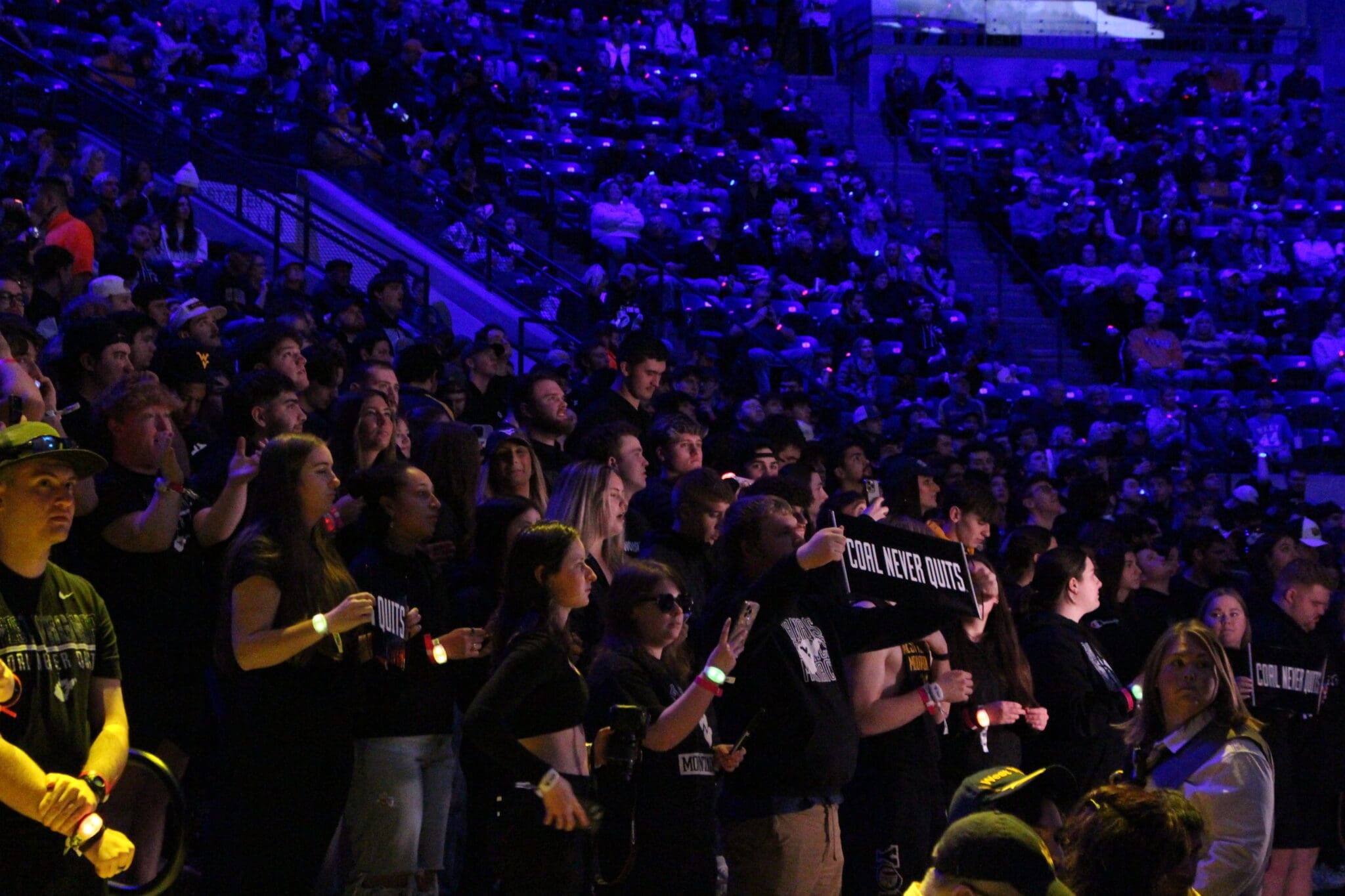 WVU basketball Fans enjoy light show before WVU basketball game at WVU Coliseum