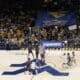 WVU Basketball crowd at Coliseum with Maniacs banner against Missouri State
