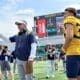WVU Football HC Neal Brown presents spring award winner