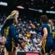 WVU Women's Basketball team huddle during Big 12 Tournament