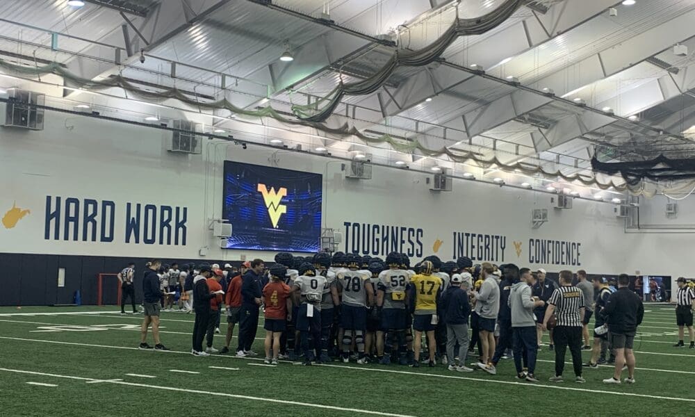 WVU Football spring practice at indoor facility stock