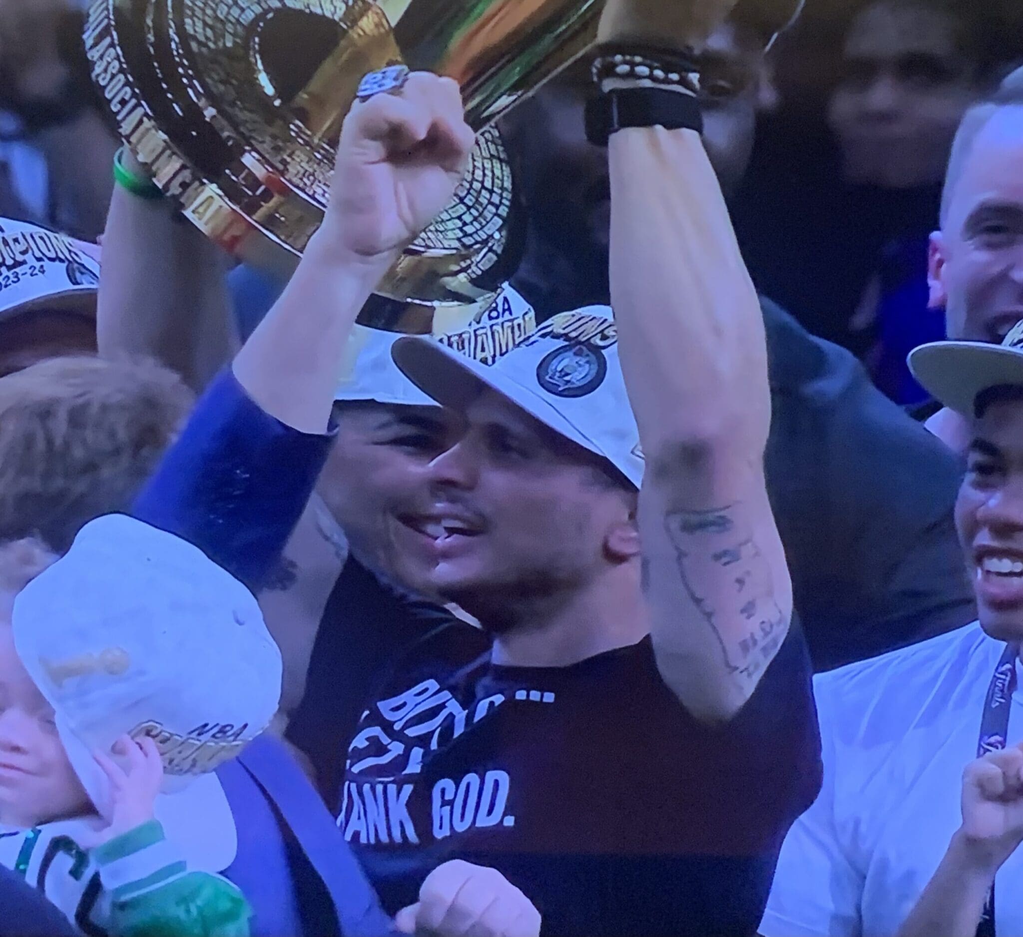 Joe Mazzulla with trophy