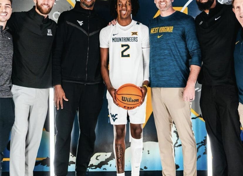 Josh Eilert and coaches recruiting Jasper Johnson