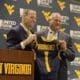WVU Football HC Rich Rodriguez and AD Wren Baker