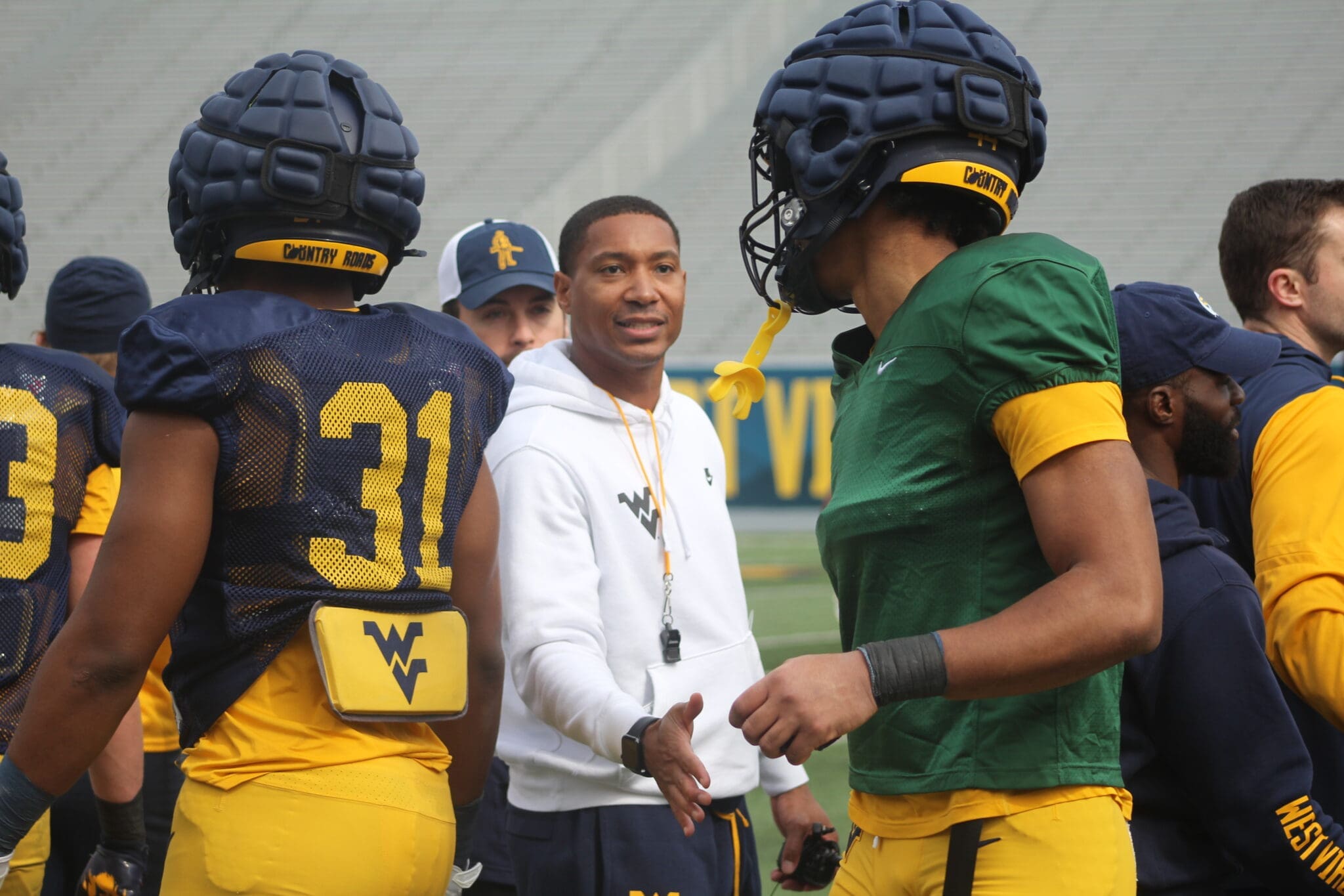 WVU Football Pat White with players