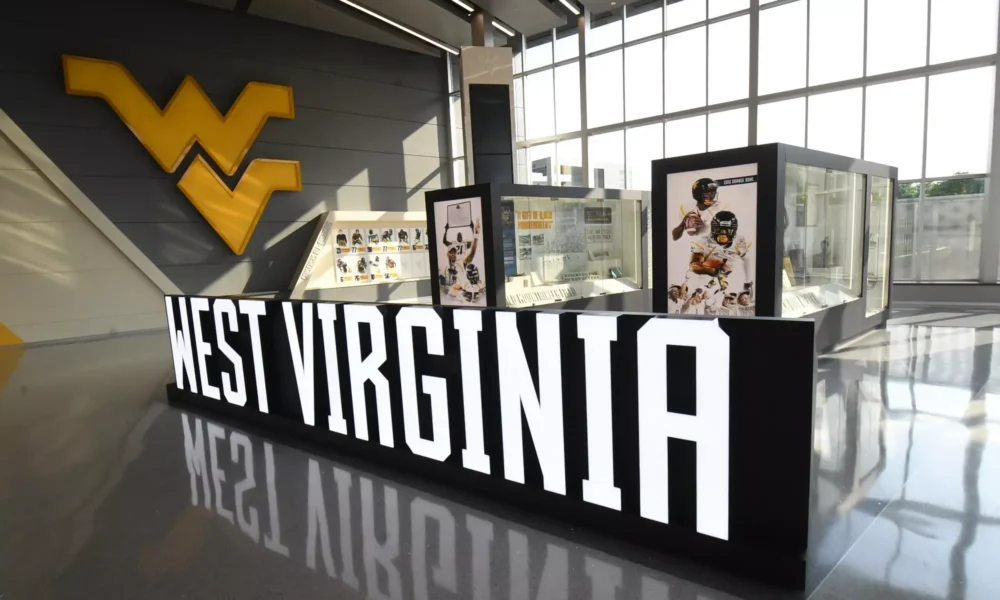 West Virginia sign at WVU Football facility stock