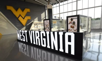West Virginia sign at WVU Football facility stock