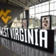 West Virginia sign at WVU Football facility stock