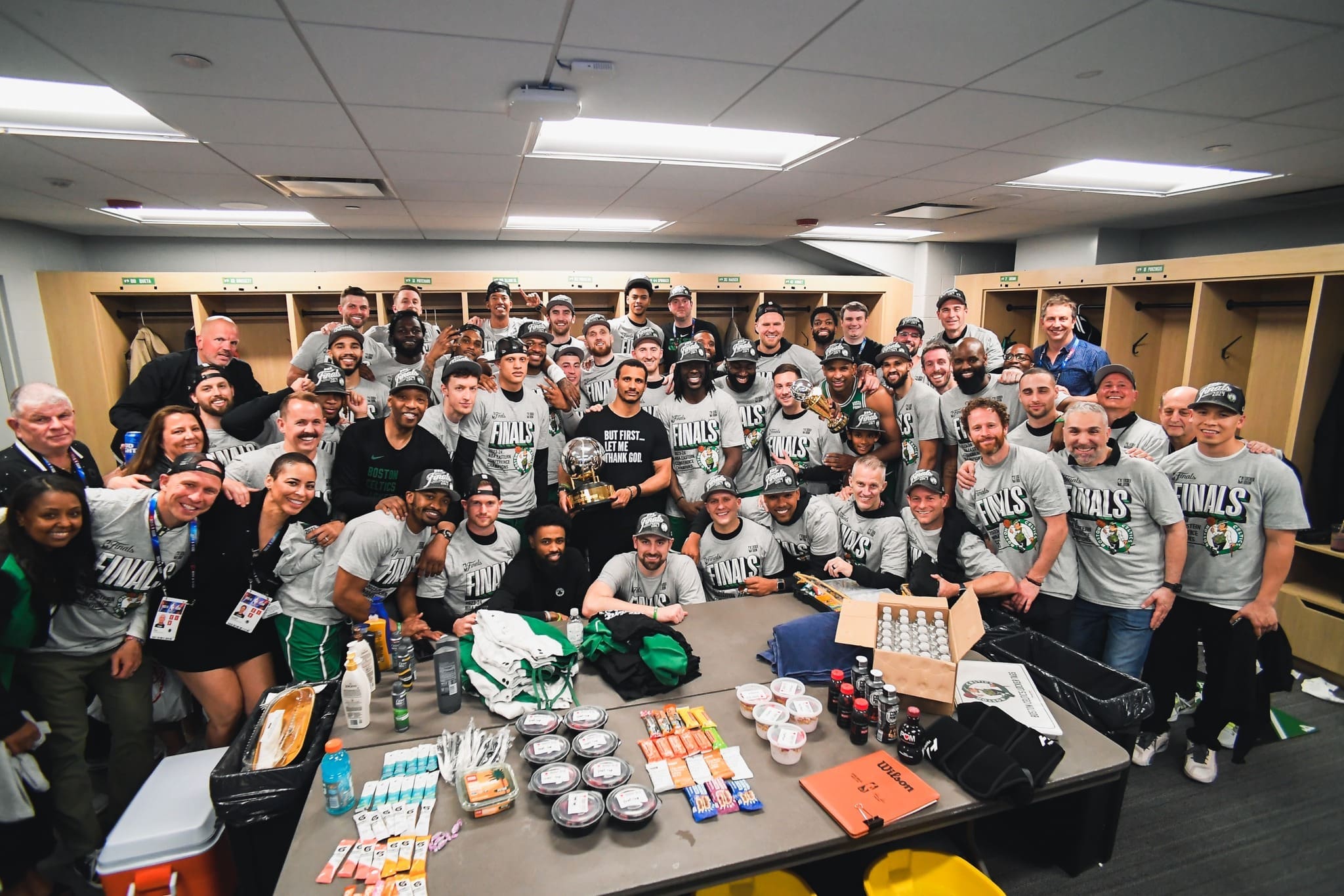 Joe Mazzulla and Celtics with East trophy