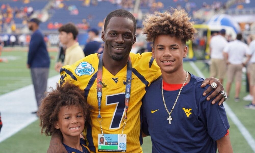 WVU Football coach and legend Noel Devine with sons