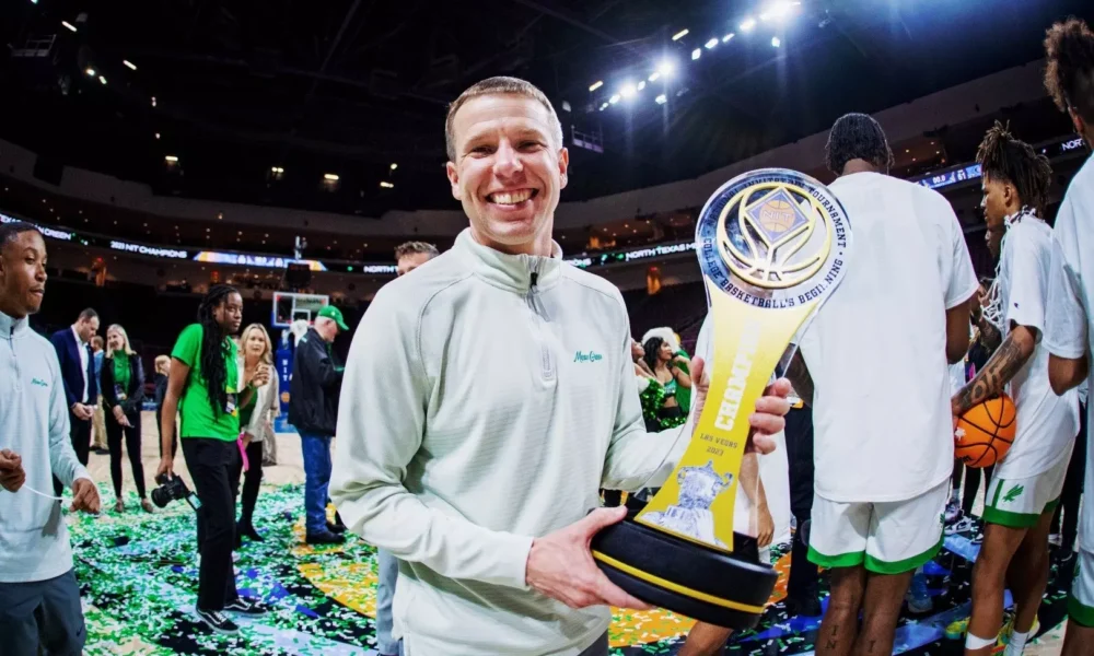 Ross Hodge with NIT trophy