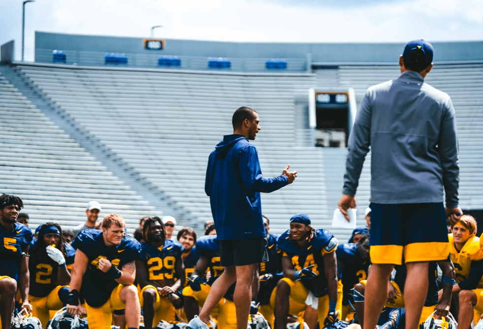 Joe Mazzulla talking to WVU football team