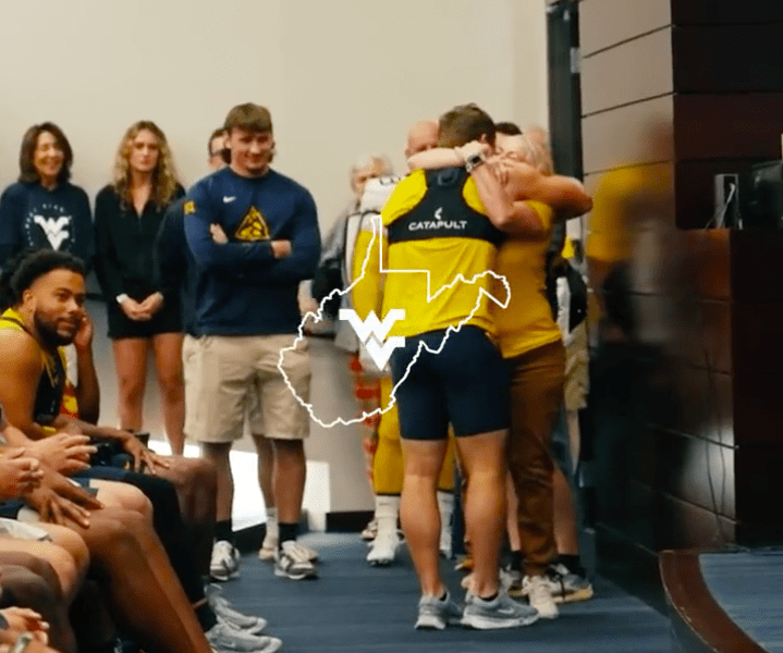 WVU Football celebrates as Caden Biser earns scholarship