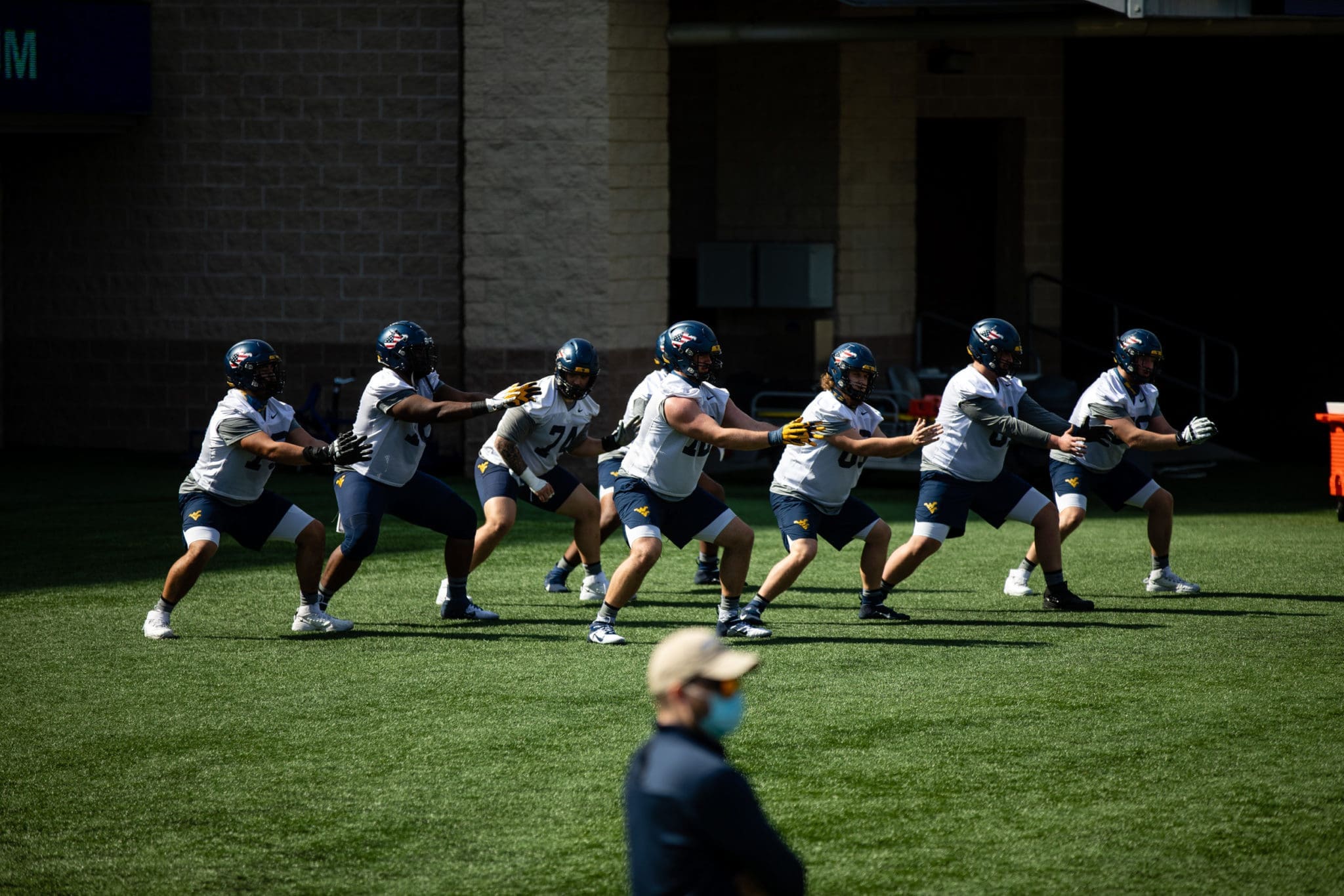 WVU football offensive line at practice