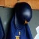 A WVU helmet hangs in the dugout as the Mountaineers played against North Carolina on June 8, 2024, in the Super Regionals of the NCAA Tournament at Boshamer Stadium in Chapel Hill, N.C. (Mitchell Northam / WV Sports Now)