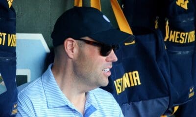 WVU AD Wren Baker looks on as WVU plays against North Carolina on June 8, 2024, in the Super Regionals of the NCAA Tournament at Boshamer Stadium in Chapel Hill, N.C. (Mitchell Northam / WV Sports Now)