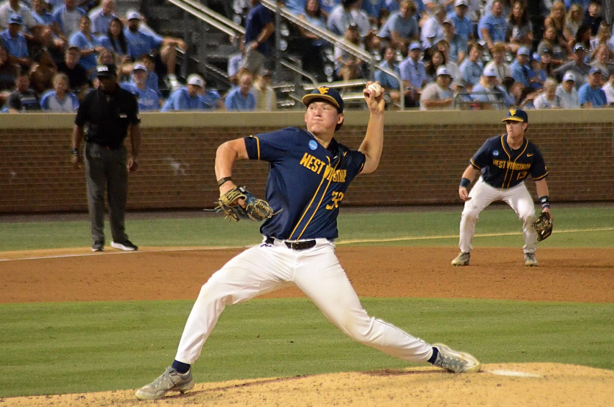 WVU Baseball pitcher Tyler Switalski pitches as the Mountaineers played against North Carolina on June 8, 2024, in the Super Regionals of the NCAA Tournament at Boshamer Stadium in Chapel Hill, N.C. (Mitchell Northam / WV Sports Now)