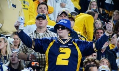WVU football fans cheer at the Duke's Mayo Bowl on Dec. 27, 2023 at Bank of America Stadium in Charlotte, N.C. (Mitchell Northam / WV Sports Now)