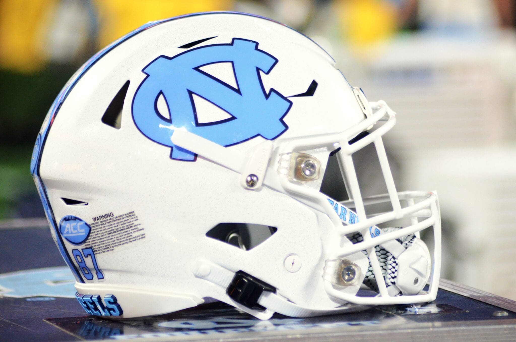 A UNC helmet rests on the sideline at the Duke's Mayo Bowl on Dec. 27, 2023 at Bank of America Stadium in Charlotte, N.C. (Mitchell Northam / WV Sports Now)