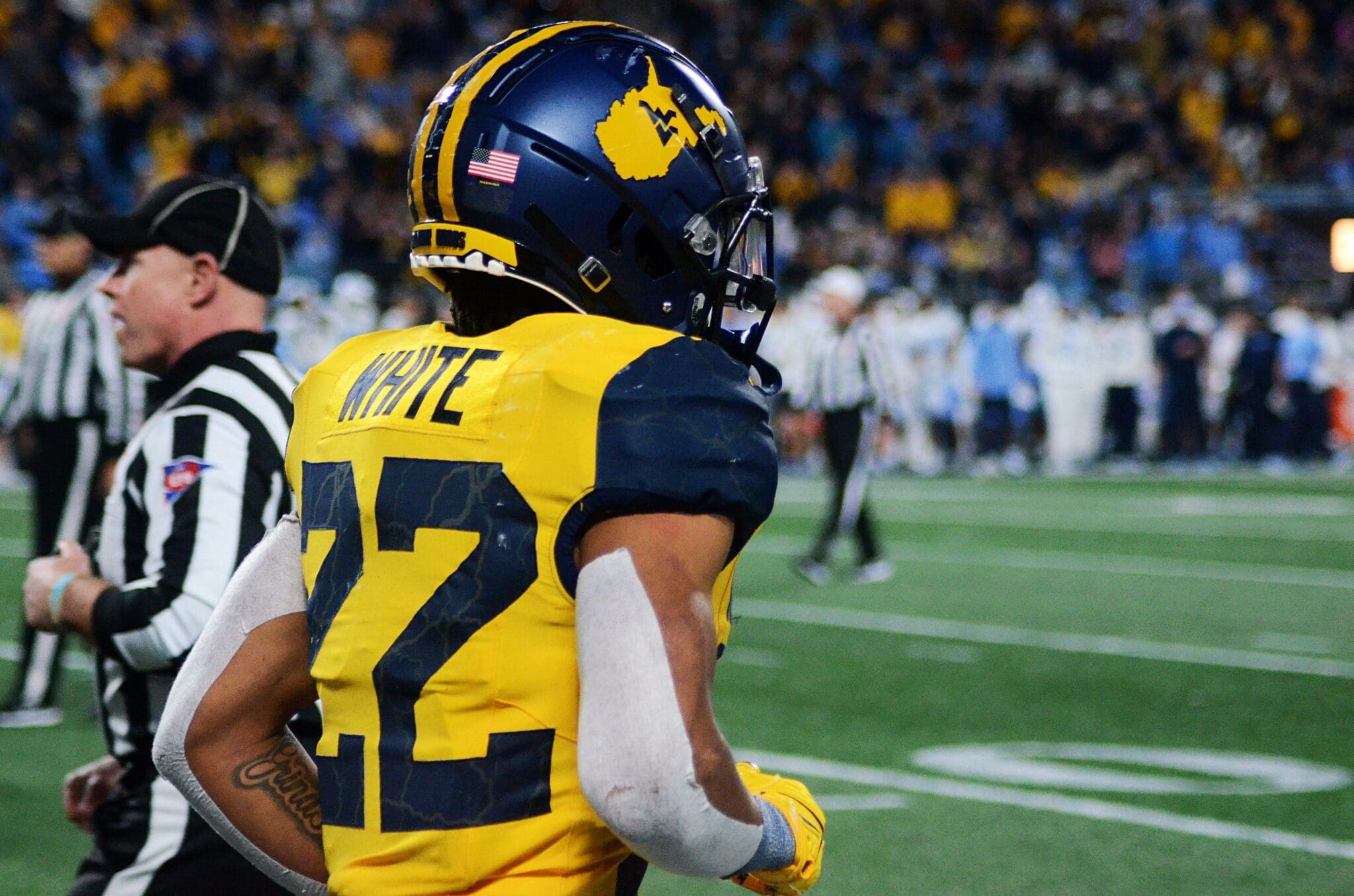 WVU running back Jahiem White celebrates his touchdown against UNC in the Duke's Mayo Bowl at Bank of America Stadium in Charlotte, N.C. on Dec. 27, 2023. (Mitchell Northam / WV Sports Now)