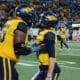WVU Football Ja'Quay Hubbard and Garrett Greene celebrate a touchdown against UNC in the Duke's Mayo Bowl at Bank of America Stadium in Charlotte, N.C. on Dec. 27, 2023. (Mitchell Northam / WV Sports Now)