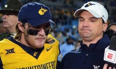 WVU Football quarterback Garrett Greene and head coach Neal Brown after beating UNC in the Duke's Mayo Bowl at Bank of America Stadium in Charlotte, N.C. on Dec. 27, 2023. (Mitchell Northam / WV Sports Now)