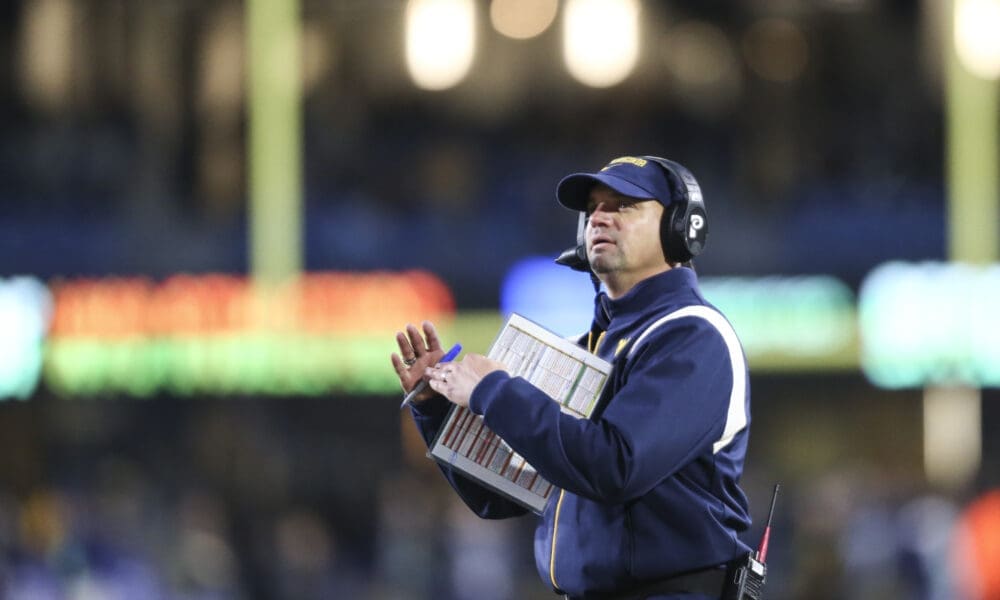 WVU Football HC Neal Brown calling a timeout