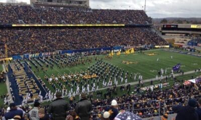 WVU Football Stadium and Field US Flags Stock