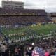 WVU Football Stadium and Field US Flags Stock