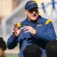 WVU Football HC Rich Rodriguez talking to team after practice