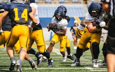 WVU Football RB Cam Cook in scrimmage