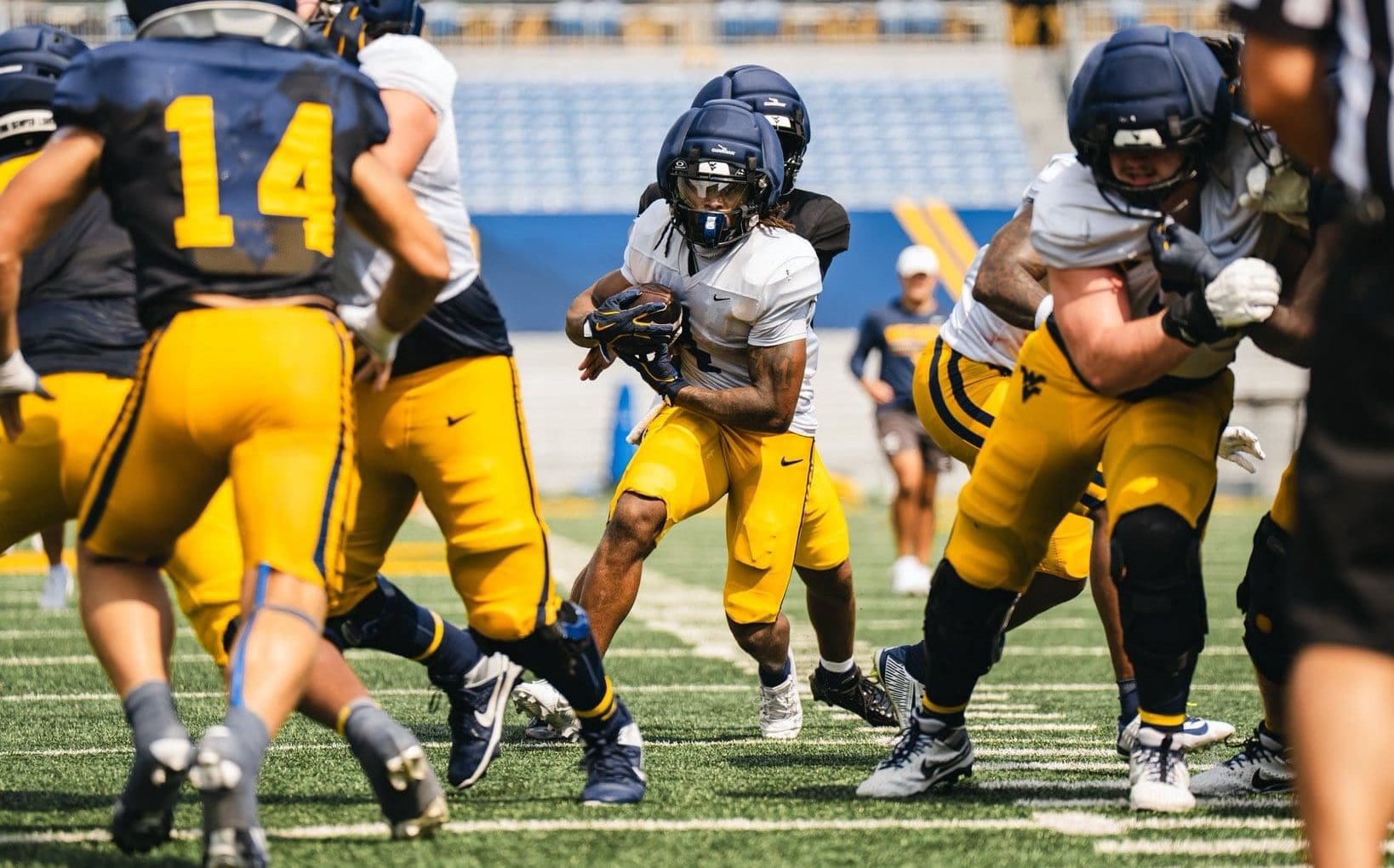 WVU Football RB Cam Cook in scrimmage