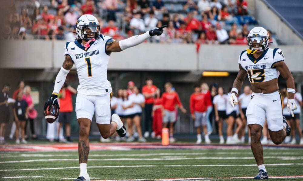 WVU Football defense with Garnett Hollis at Arizona
