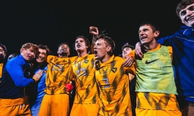 WVU soccer celebrating