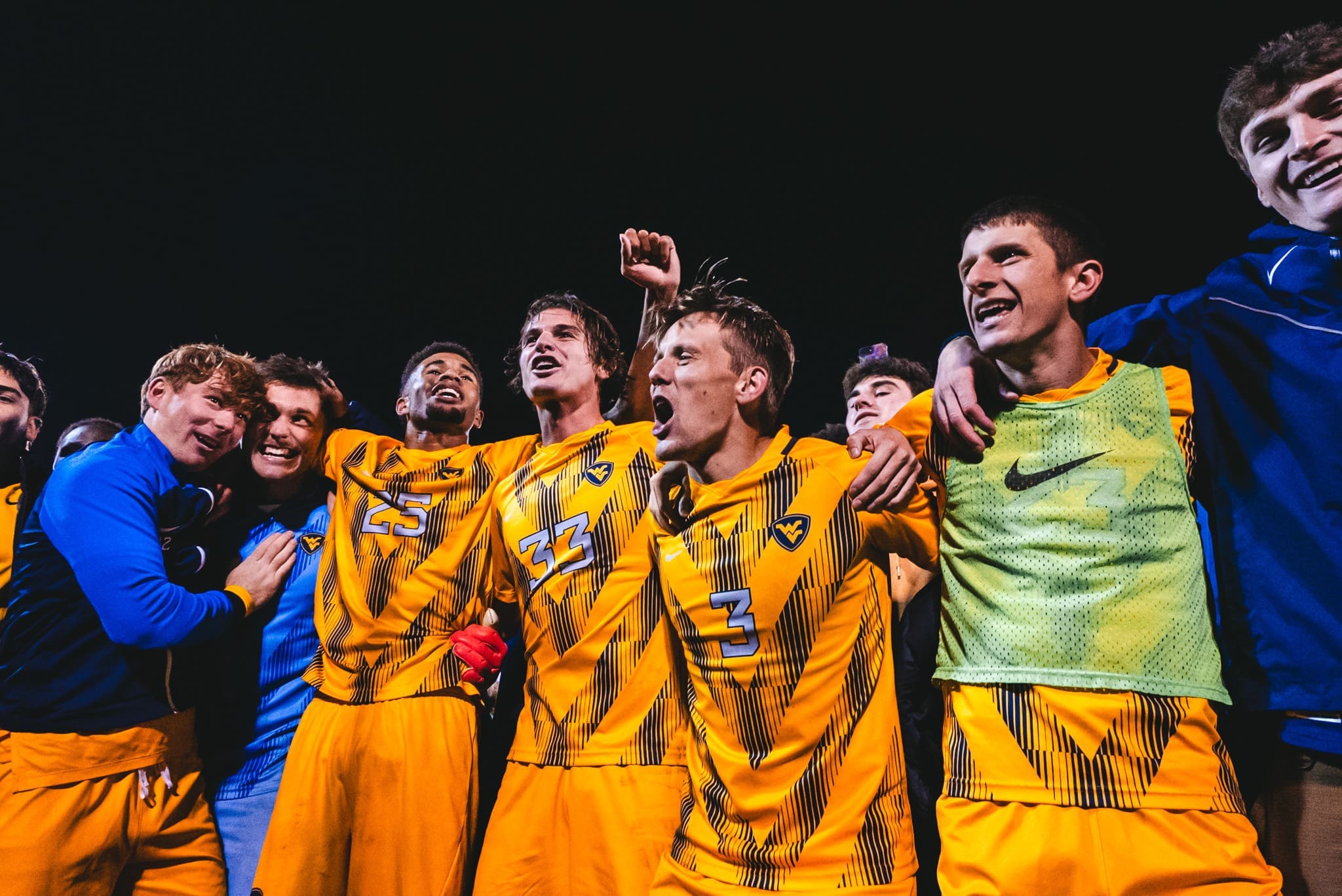 WVU soccer celebrating