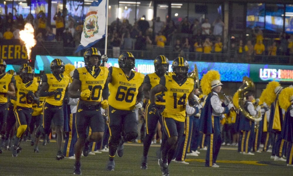 WVU Football OL Ja'Quay Hubbard with flag