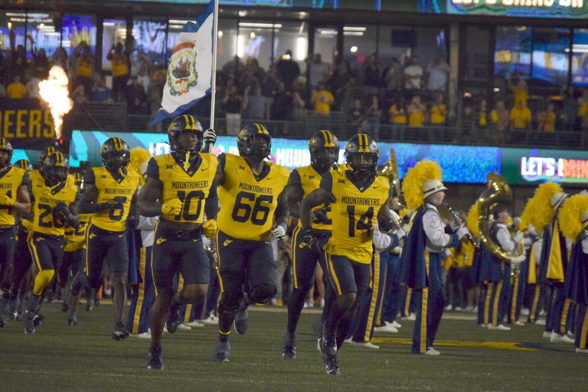 WVU Football OL Ja'Quay Hubbard with flag