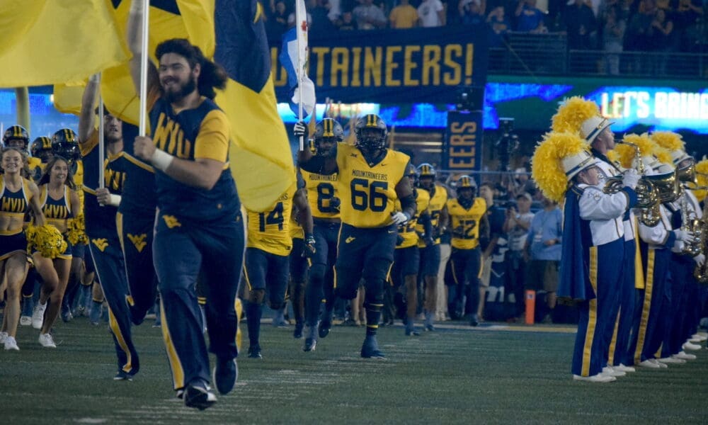 WVU Football OL Ja'Quay Hubbard with flag