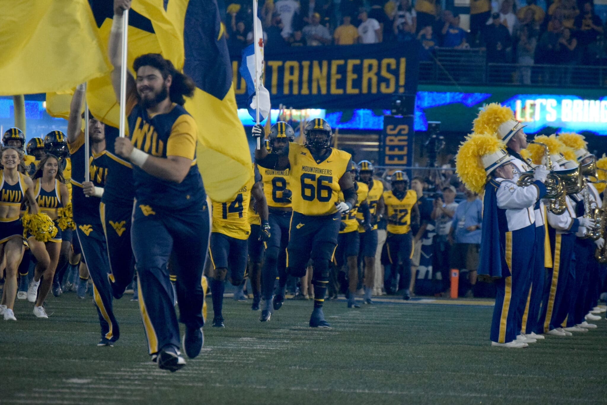 WVU Football OL Ja'Quay Hubbard with flag