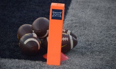 WVU Football Big 12 logo with footballs stock