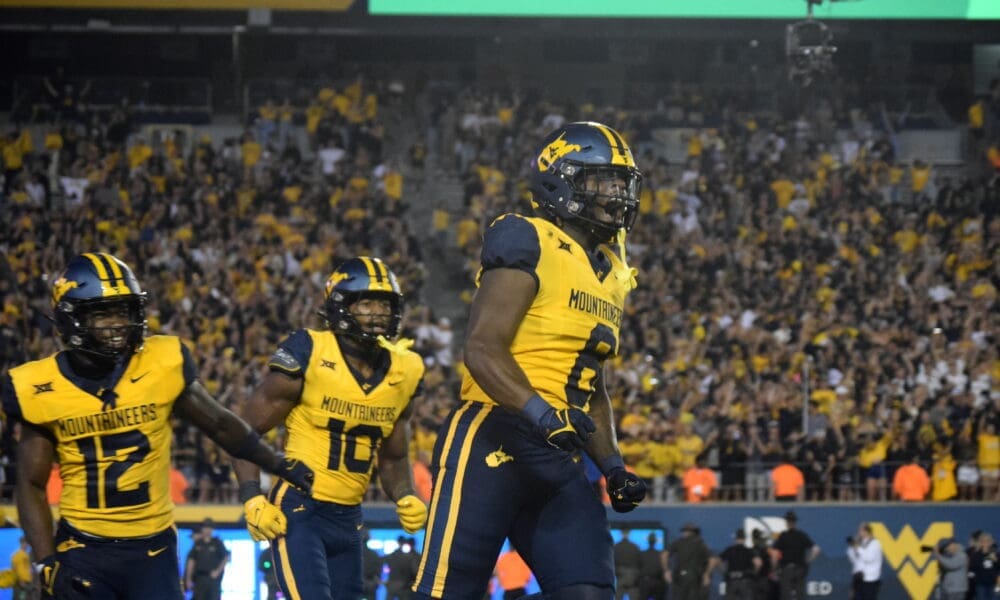 WVU Football Defense Jared Bartlett and Tyrin Bradley against Pitt