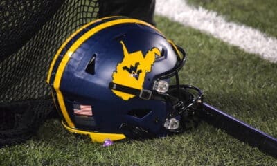WVU Football blue helmet stock
