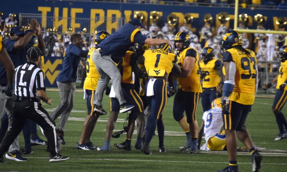 WVU Football Defense celebrates